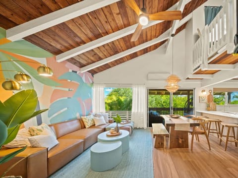 Gather, relax, and connect in a wide-open layout with lofty ceilings.