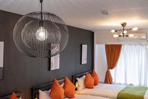 Superior House, Balcony | 3 bedrooms, blackout drapes, iron/ironing board, free WiFi