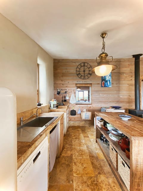 Family Room, Patio, Sea View | Private kitchen