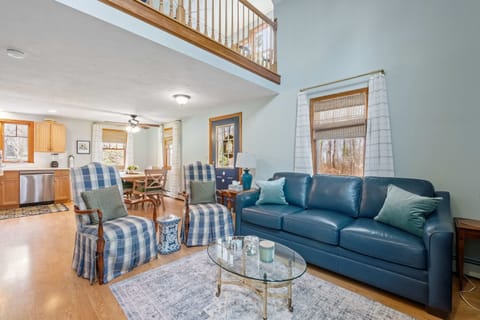 Feel instantly at ease in this bright and spacious living area, with a lofted ceiling that adds an extra touch of coastal charm.