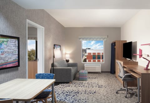 Suite, 1 Bedroom | Desk, blackout drapes, iron/ironing board, free WiFi