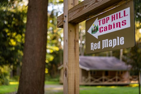 Red Maple Sign in front of the cabin