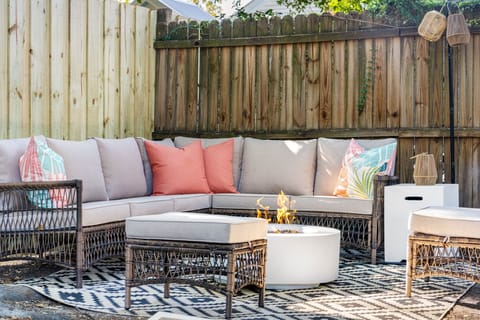 Patio with firepit and plush seating