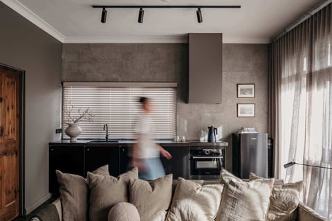 A well equip kitchen with induction cook top, oven and microwave, Nespresso machine and cooking basics.