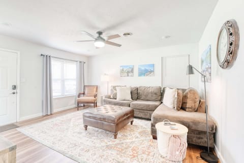 Bright and open, this living room’s flowing layout and natural light create a warm, inviting space perfect for making memories together.