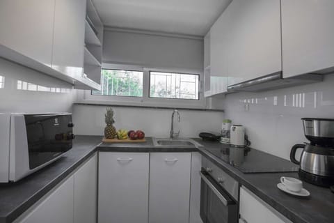 Comfort Apartment, 2 Bedrooms, Sea View | Private kitchen | Full-size fridge, oven, stovetop, coffee/tea maker
