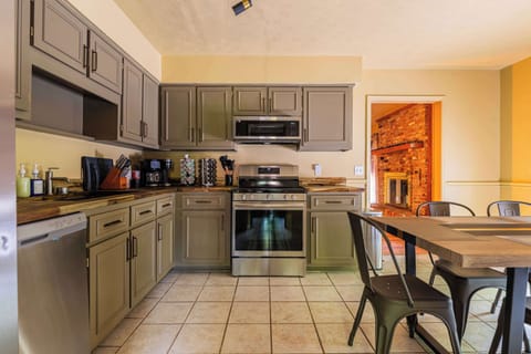 Enjoy a spacious dining room with seating for everyone — ideal for relaxing evenings after a day near Fort Moore, GA!