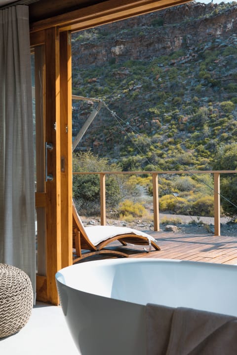 Dwyka Tented Lodge 1 | Bathroom | Separate tub and shower, deep soaking tub, rainfall showerhead