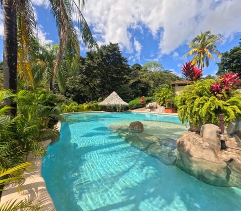 Outdoor pool, open 6 AM to 6 PM, sun loungers