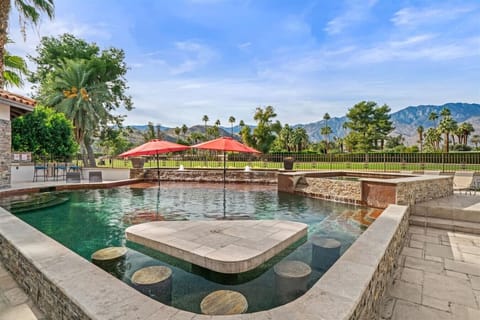 Sunken pool table and submerged bar stool