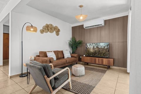 Bright, airy living room with bamboo accents and open layout
