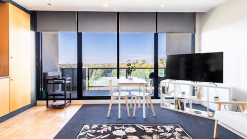 Floor-to-ceiling windows create a bright and spacious atmosphere