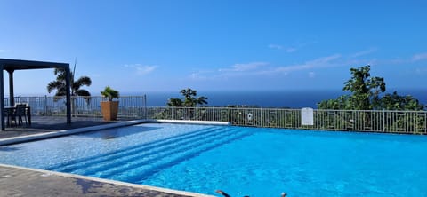 Live your dream  life. Infinity pool, Ocho Rios views, Caribbean skies.