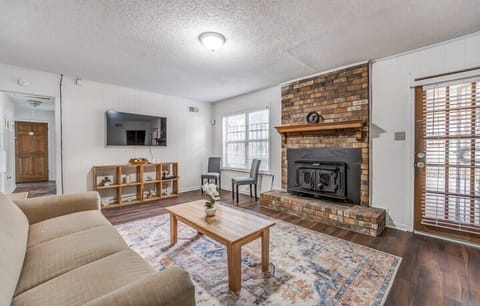 Living room with decorative fireplace