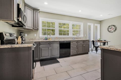 Unit A - Fully equipped space for cooking.