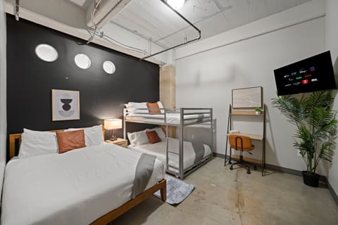 Bedroom with 32` Smart TV with Streaming Services in Master Bedroom