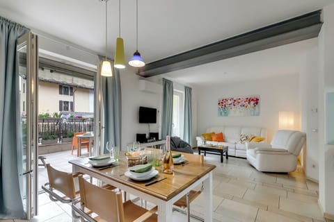 Standard Apartment, Multiple Bedrooms (Flower House) | Living area | 21-inch flat-screen TV with cable channels