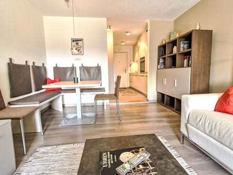 Furniture, Interior Design, Flooring, Wood, Floor, Room, Living Room, Couch, Apartment, Ceiling