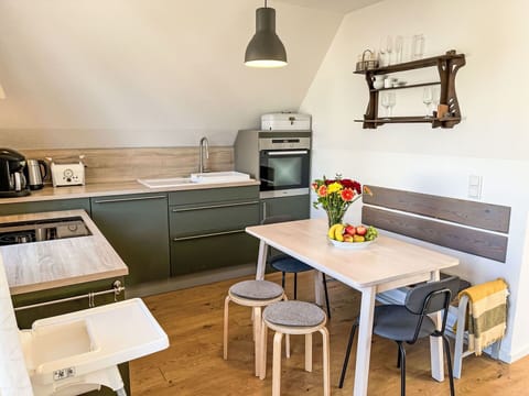 Furniture, Flooring, Wood, Interior Design, Floor, Kitchen, Countertop, Wood Flooring, Lighting, Kitchen Appliance