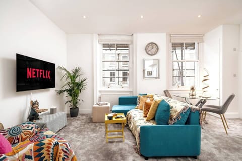 Step into a space that effortlessly blends comfort and modern design. Sink into the plush sofa and relax while enjoying the sophisticated ambiance created by the sleek decor and thoughtful touches. 