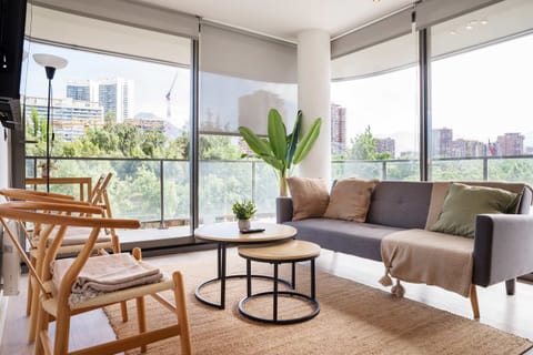 Enjoy stunning city views from this bright and cozy living space, perfect for relaxation.