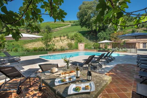 Outdoor pool, open 9:00 AM to 7:00 PM, sun loungers