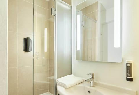 Shower, free toiletries, hair dryer, towels