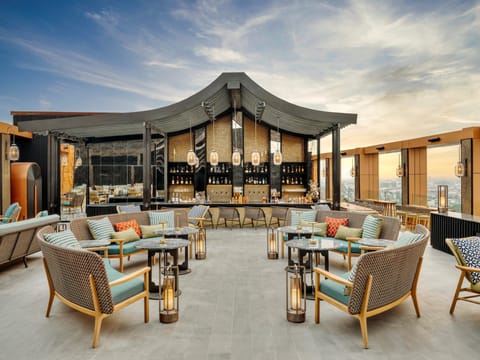 2 bars/lounges, rooftop bar, lobby lounge