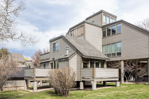 - Mountain retreat exterior with unique multi-level design and deck space  
- Surrounded by trees and natural scenery for a private getaway  
- Elevated layout adds charm and perfect cabin-style atmosphere