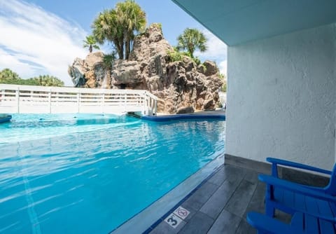 Soak up sunshine beside the lagoon-style pool and rock feature.