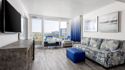 Stretch out on the sofa and watch the coastline glow.