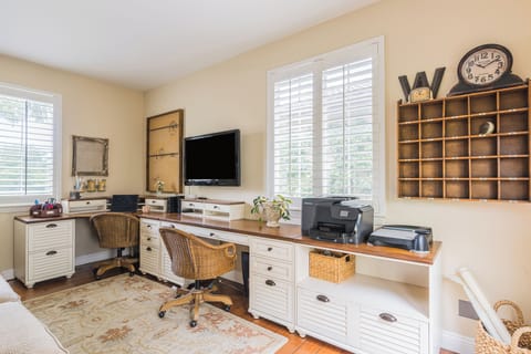 Dedicated office with room for two — work-ready and comfortable.

