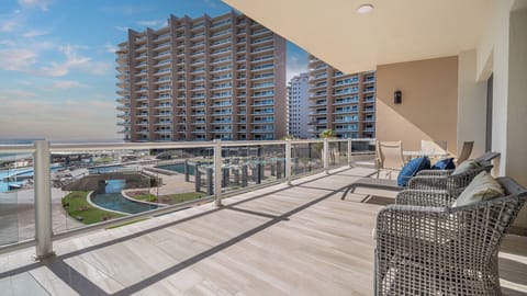 Grand balcony with the resort grounds outside.
