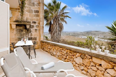 Standard Apartment, 3 Bedrooms, Microwave (Sea & Valley Views Żebbuġ Gozo) | Outdoor dining