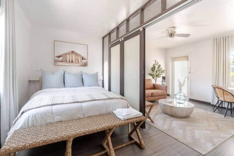 The space can be left open or closed off with frosted glass doors for privacy as needed.