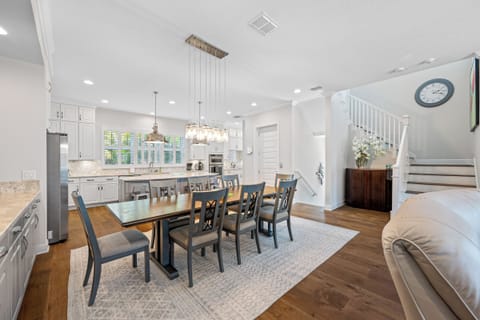 Large dining table with unique chandelier