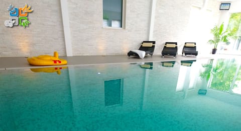 Indoor pool, open 9:00 AM to 10:00 PM, sun loungers