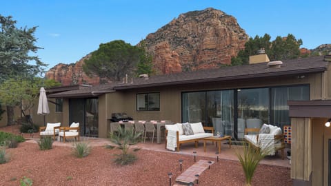 Cascading red rock views from this elevated home.