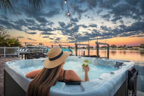 Relax in the soothing hot tub overlooking the bay.  