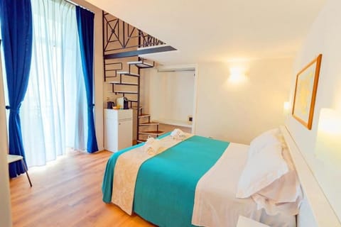 Comfort Quadruple Room, Courtyard View | Egyptian cotton sheets, premium bedding, down comforters