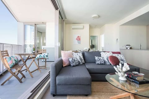 Relax in air-conditioned comfort as you watch TV in the living room, or open the sliding doors to the balcony and let the breeze sweep through.