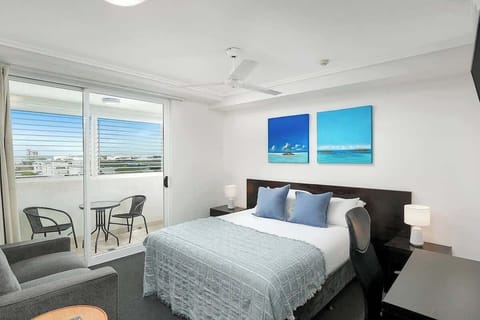 Kick back and watch TV in the king bed, or make your way out to the undercover patio with views across the city.