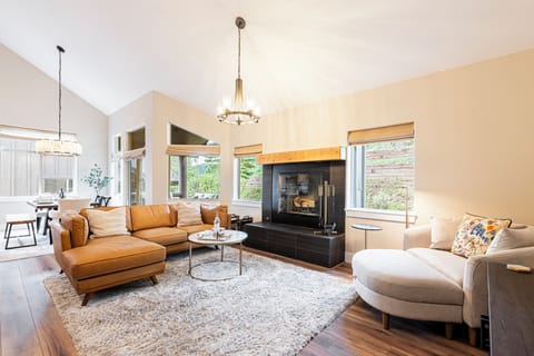 Living Room with New Furnishings and Oversized Wood-Burning Fireplace