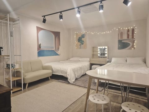 Quad Room (shared kitchen, shared bathroom) | Free WiFi, bed sheets