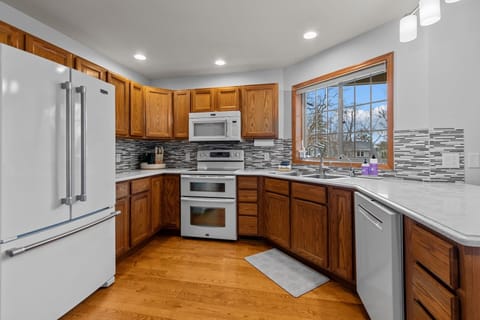 Full sized refrigerator, double oven, microwave, and dishwasher