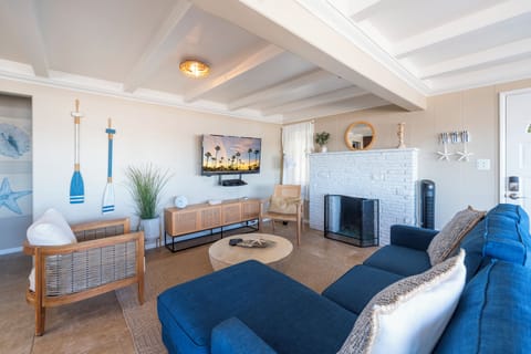 A beautifully designed living room with a warm, inviting atmosphere. (Edgewater B)