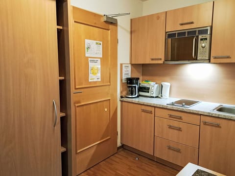 Wood, Interior Design, Flooring, Furniture, Floor, Cabinetry, Kitchen, Kitchen Appliance, Major Appliance, Room