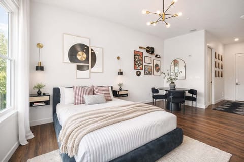 Bedroom: A thoughtfully designed bedroom with hotel-quality comfort, soft textures, and calming tones. Ideal for couples or small groups on a quick, stylish getaway.