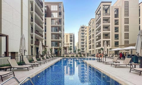 Poolside Oasis: Dive into relaxation with gleaming waters and stylish loungers under the sun!