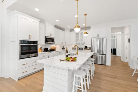 Chef Inspired Kitchen: Quartz countertops, premium cabinetry